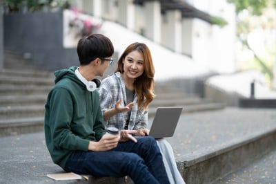 young-asian-college-students-reading-books-studyi-2023-03-28-20-22-10-utc